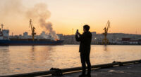 Ukrainian Drone Attack On Russian Port City Kills Four. Fire Reported At Port.
